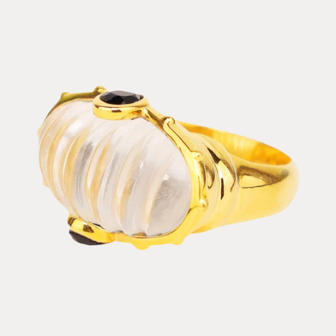 BuDhaGirl gold ring with a clear dome resin stone and a crystal on a white background