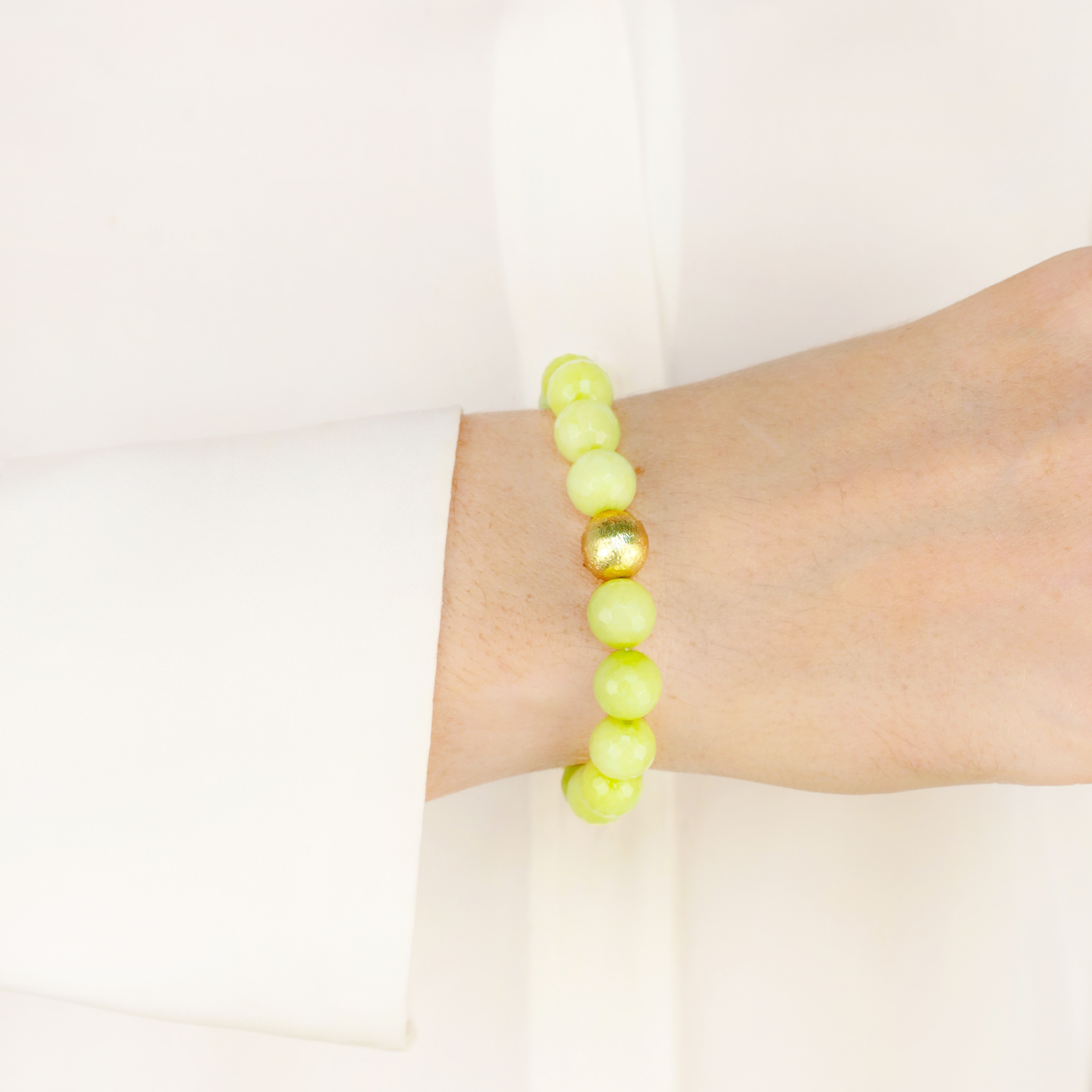 a hand wearing a bracelet