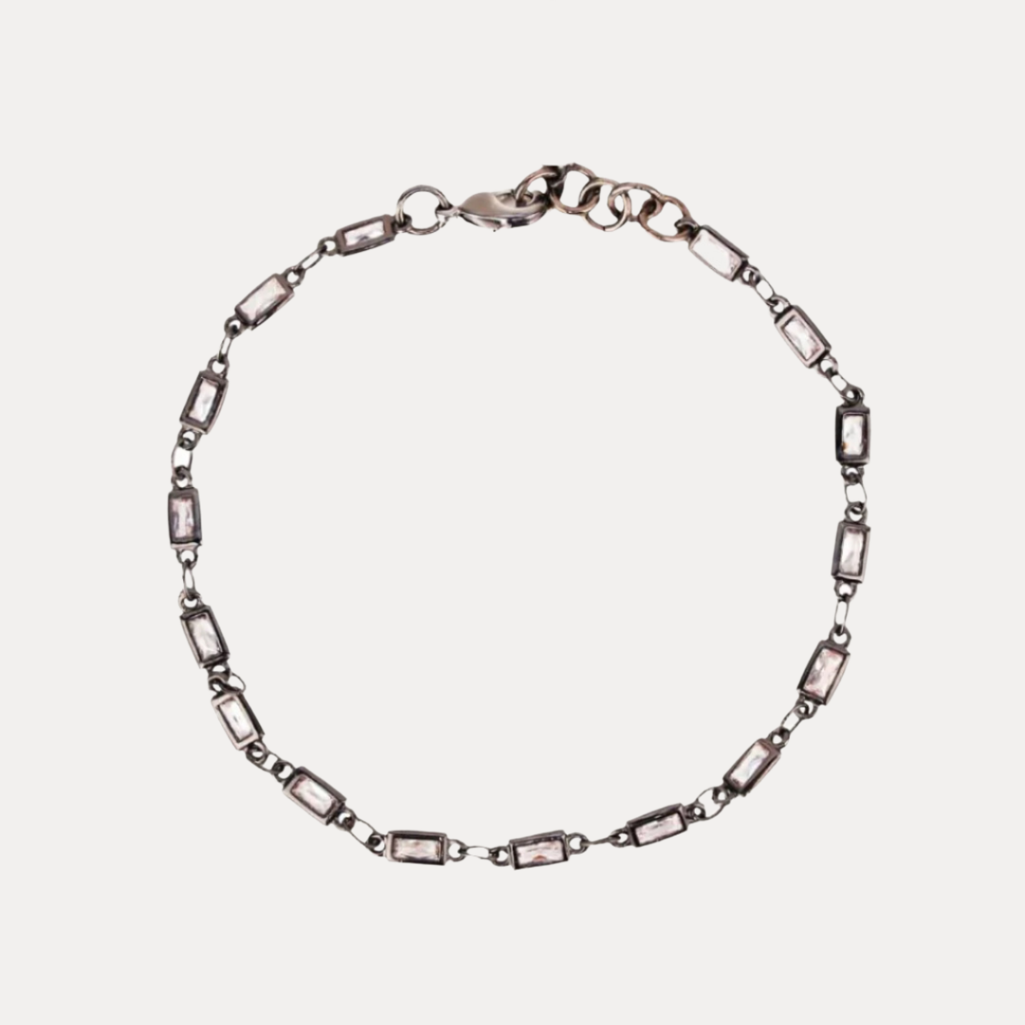 a bracelet with rectangles and rectangles