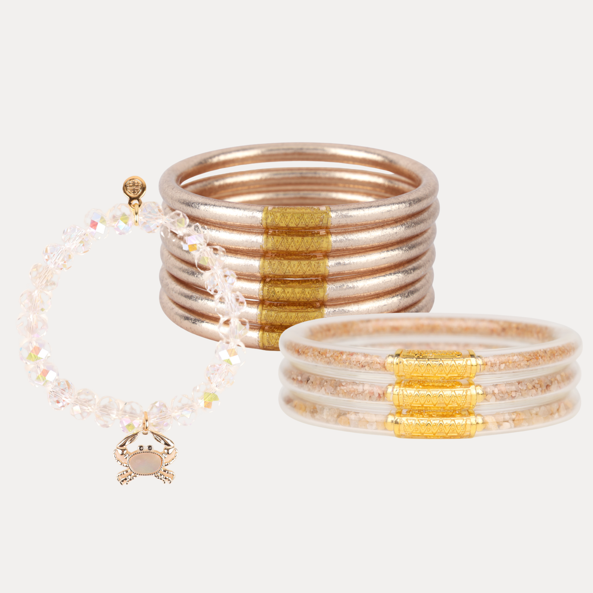 a group of bracelets with a pendant