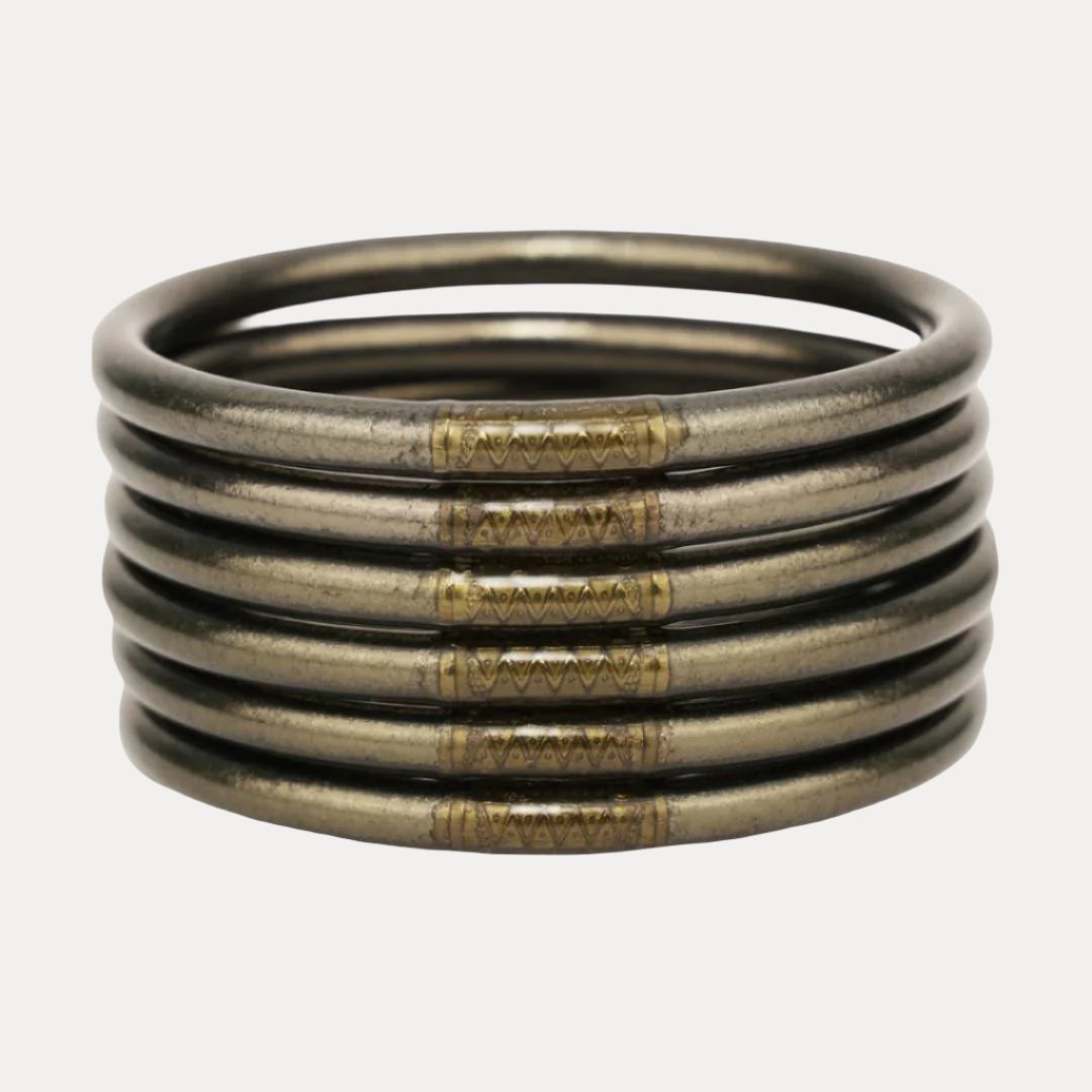A stack of Flint All Weather Bangles, which are made of polyvinyl carbonate tubing that will last for years to come. The bangles are available in four sizes, Small, Medium, Large & Extra Large.