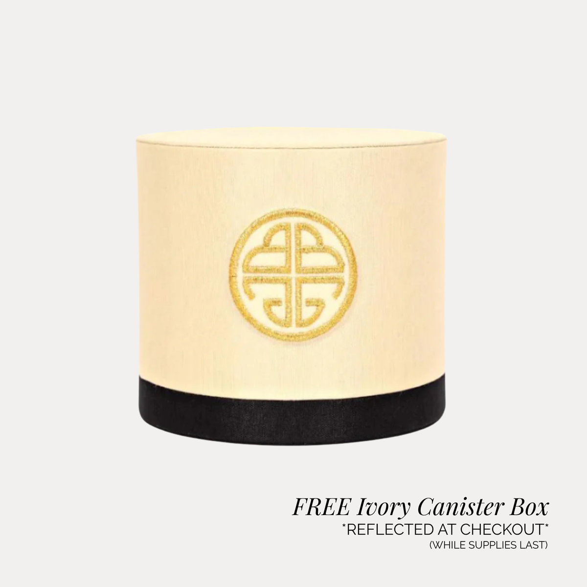 BuDhaGirl ivory canister box with a gold circular emblem and black base shown as complimentary gift packaging for the Sovereign Gifting Bundle