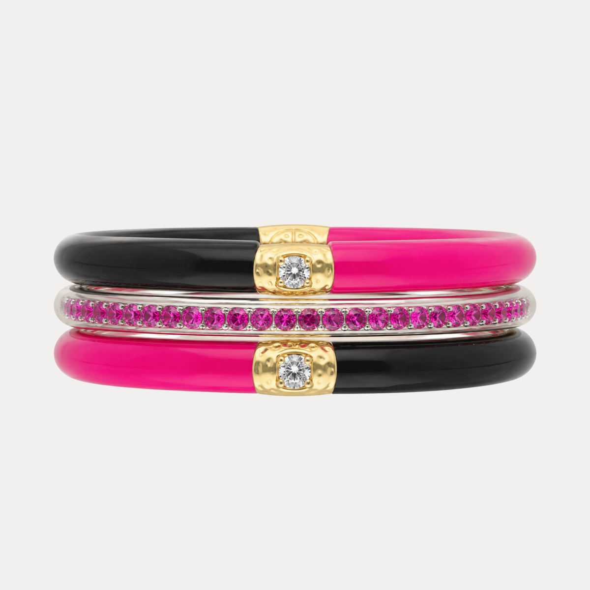 a stack of pink and black bracelets