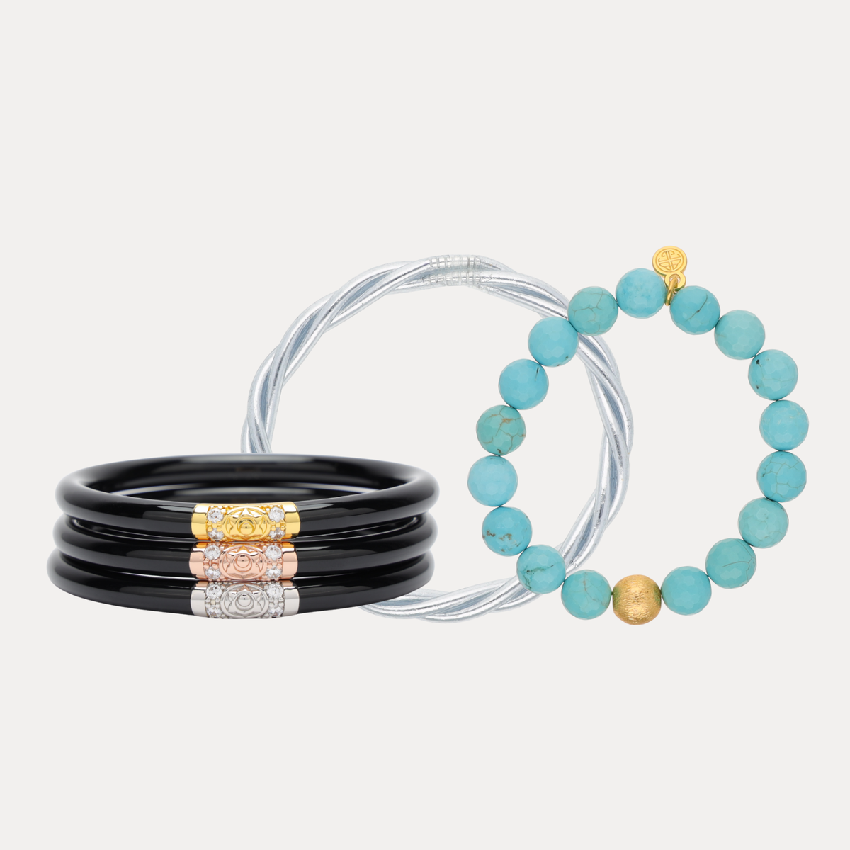 a group of bracelets with a blue stone bead