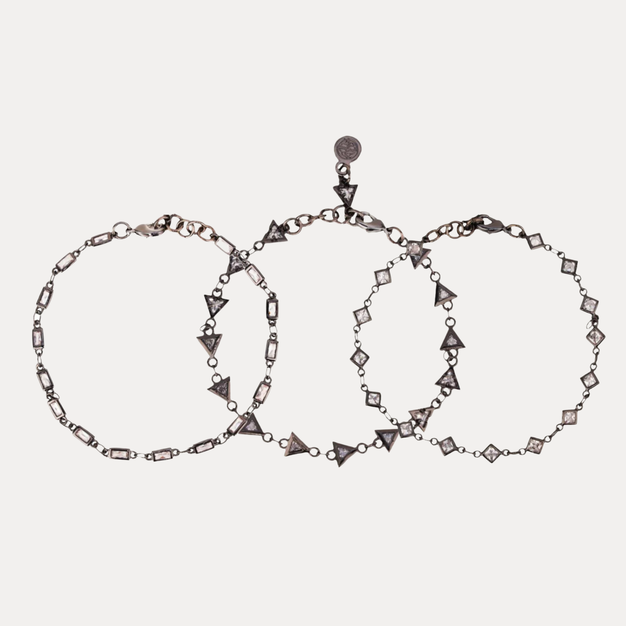 a group of bracelets with diamonds