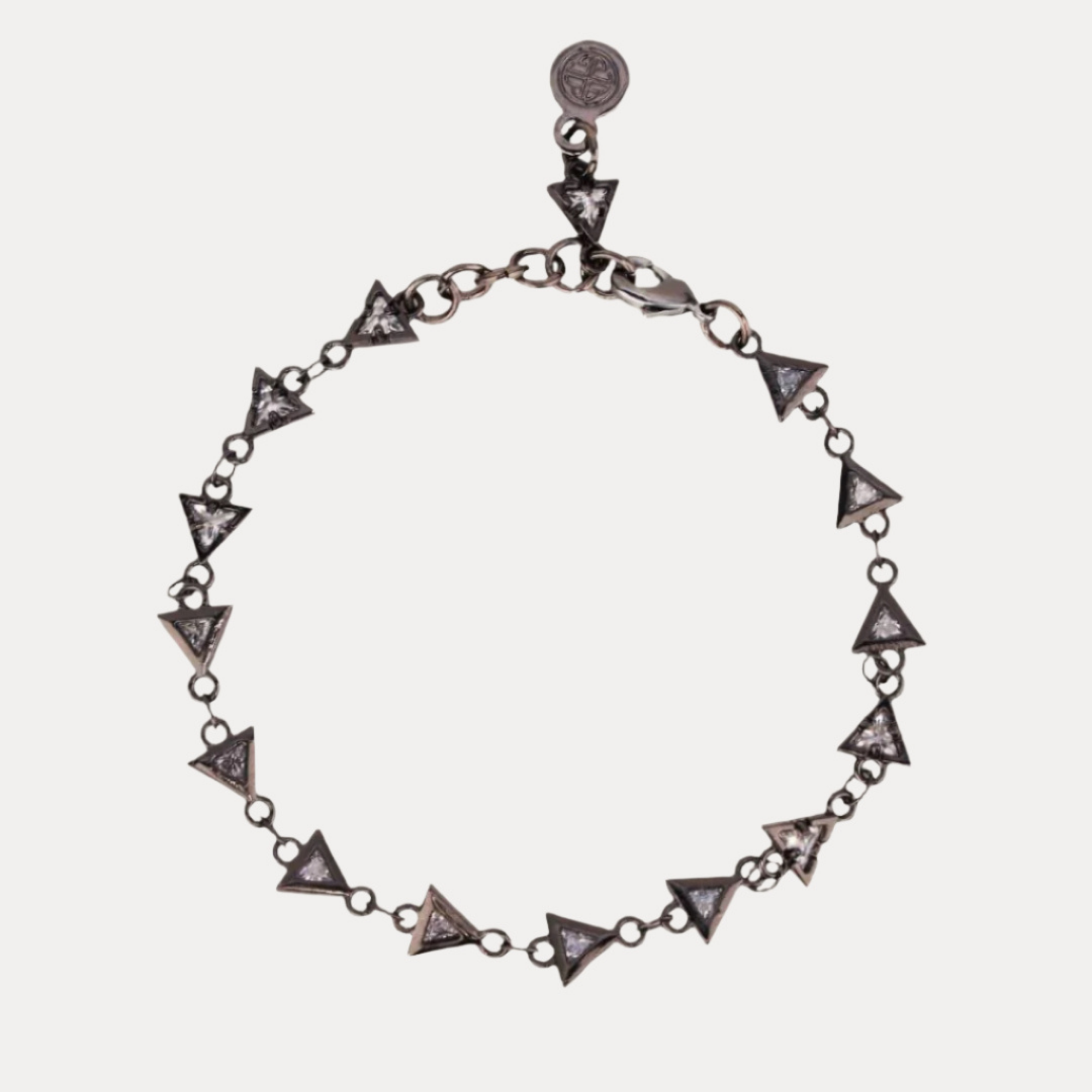 a bracelet with triangles on it