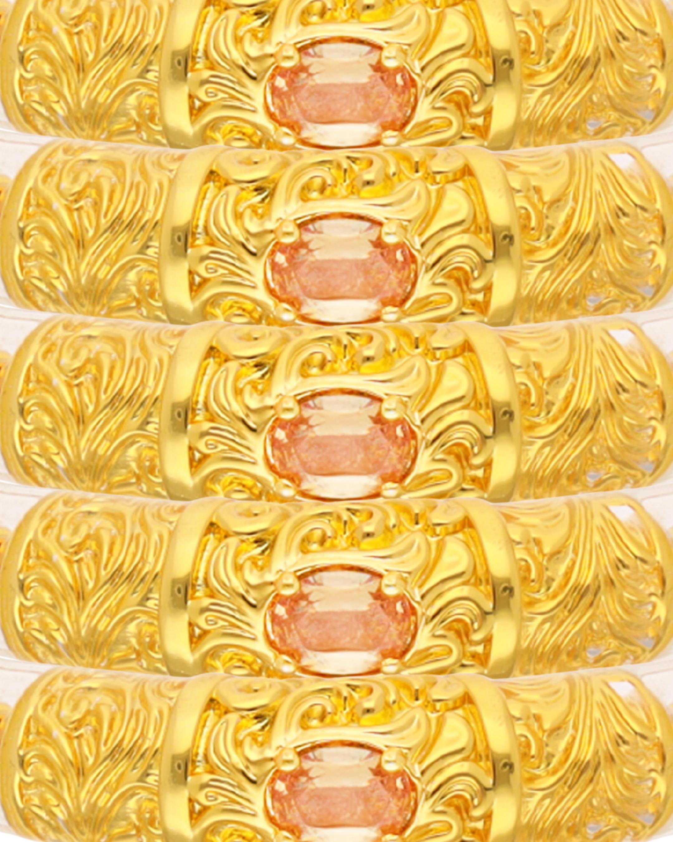 a close up of a gold and white bracelet