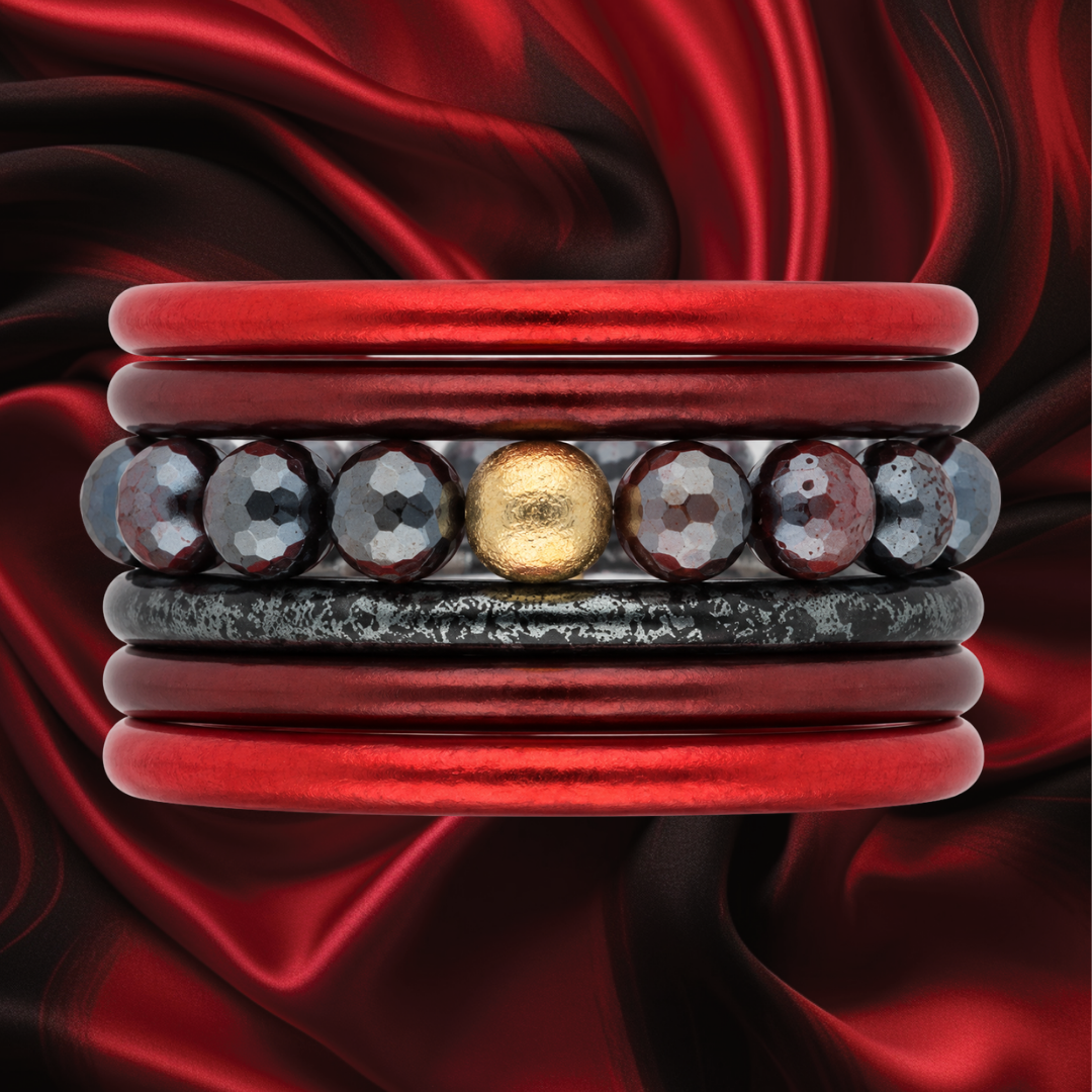 a red and black bracelet with gold and silver beads